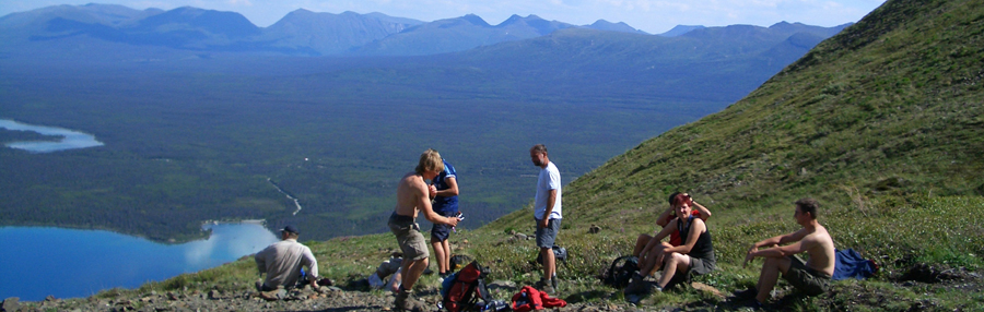 Rocky Mountain Adventure - Eating lunch on a mountain ridge overlooking some alpine lakes